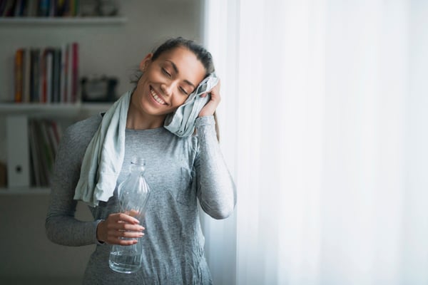 Woman Exercising and toweling off