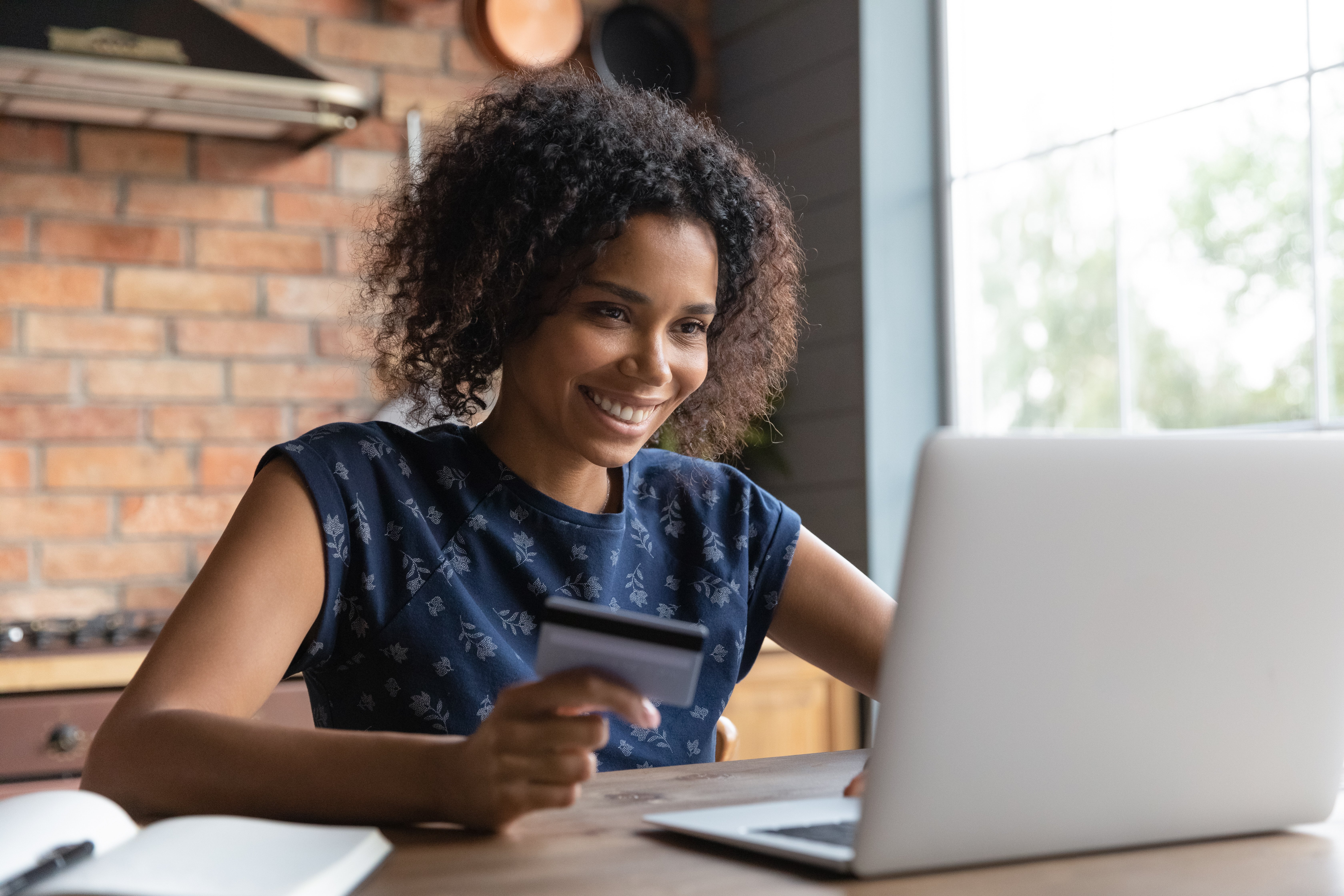 Woman paying mortgage online.